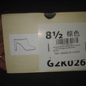 Women slip on heeled mules